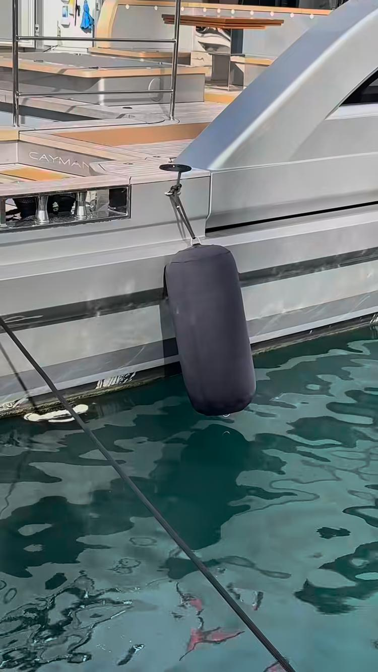 Luxury yacht moored in Gibraltar harbour — ready for professional hull cleaning